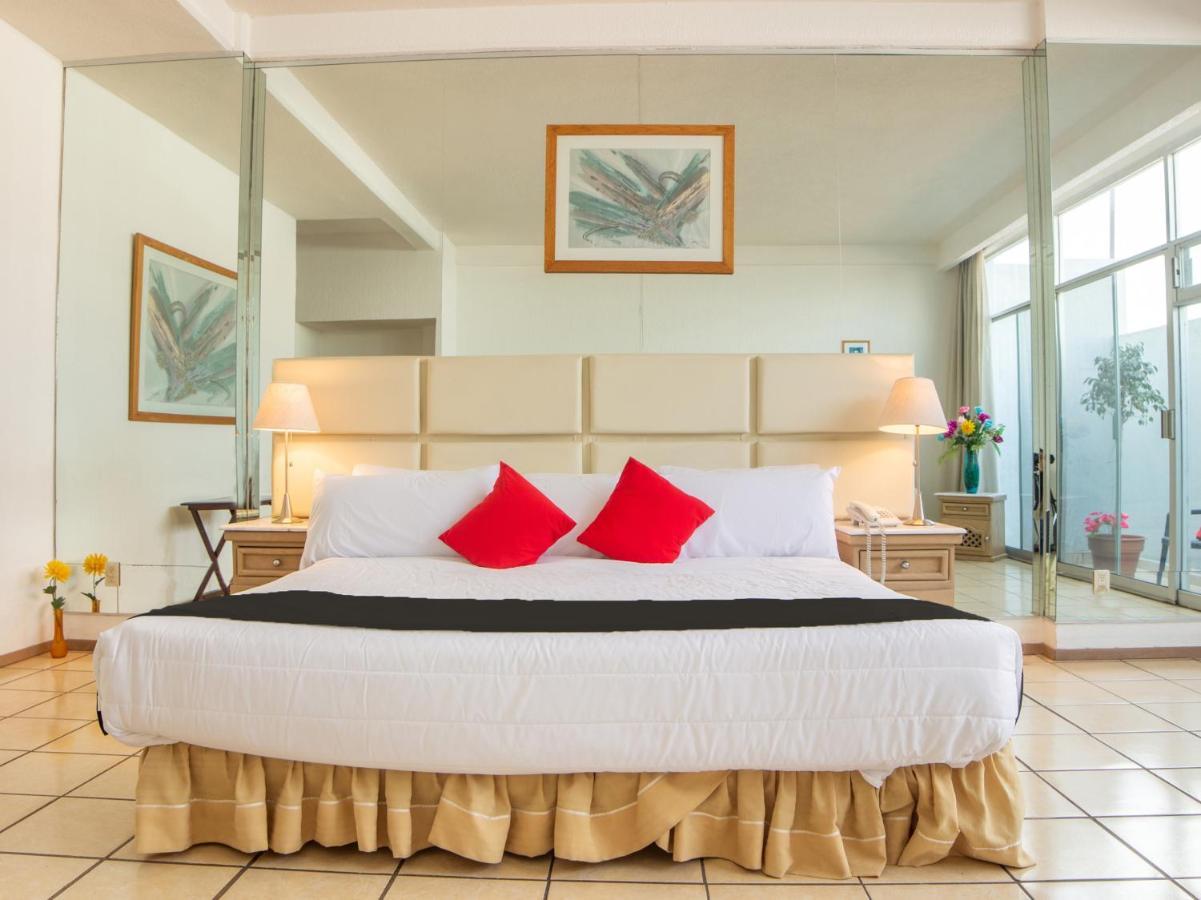 Capital O Hotel Villa Monini Пуэбла Экстерьер фото