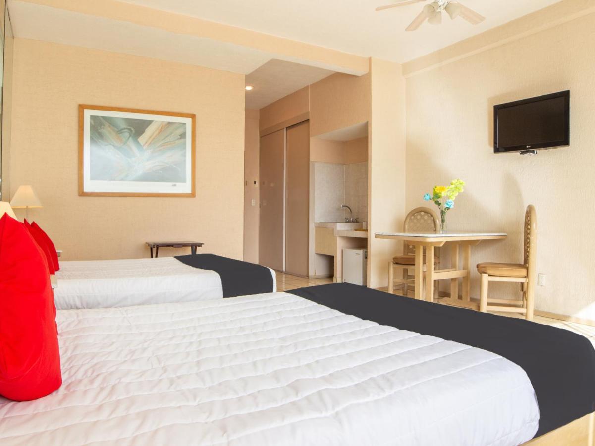 Capital O Hotel Villa Monini Пуэбла Экстерьер фото