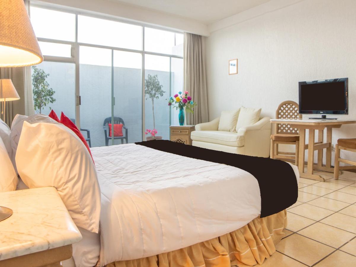 Capital O Hotel Villa Monini Пуэбла Экстерьер фото