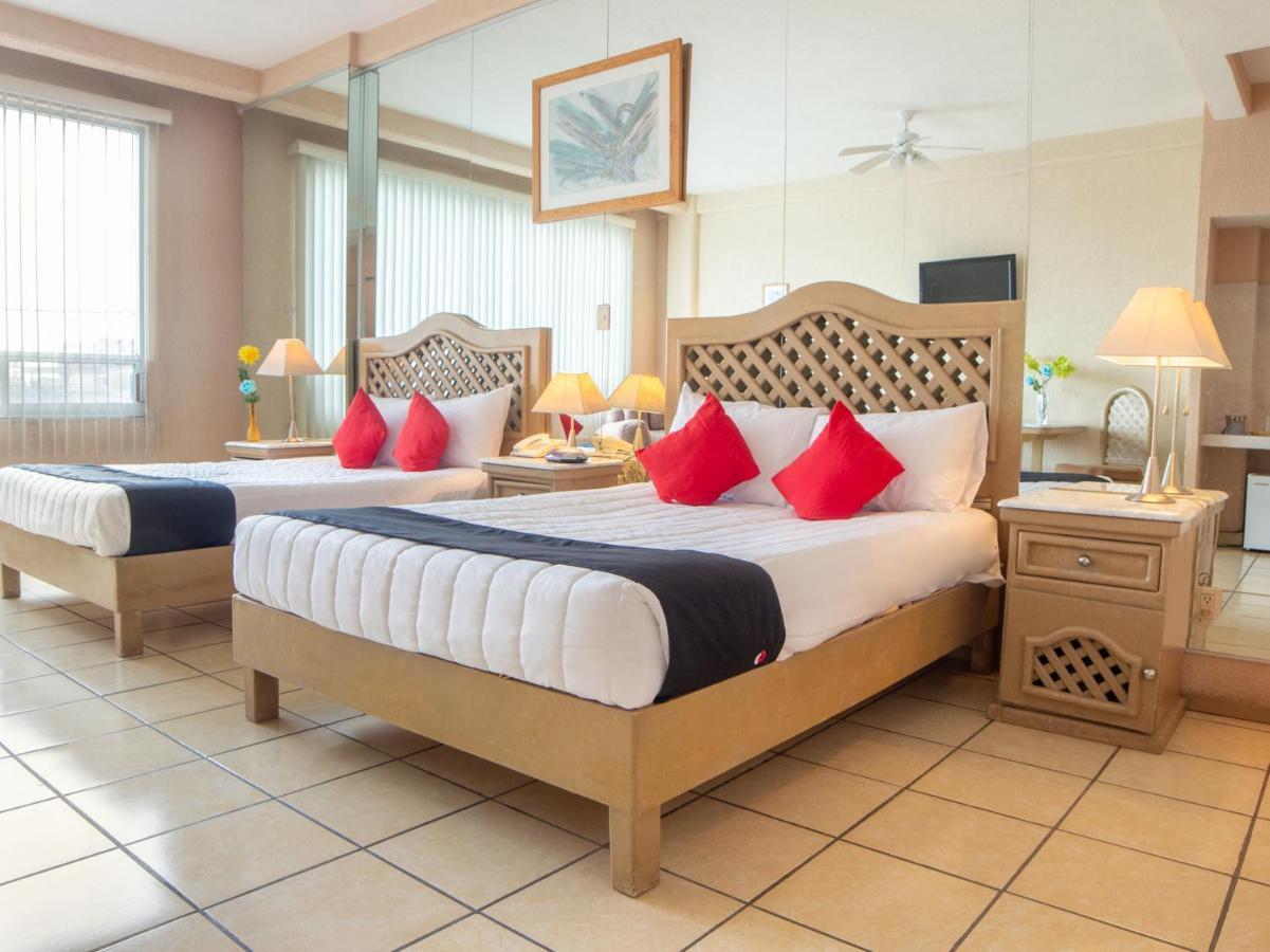 Capital O Hotel Villa Monini Пуэбла Экстерьер фото