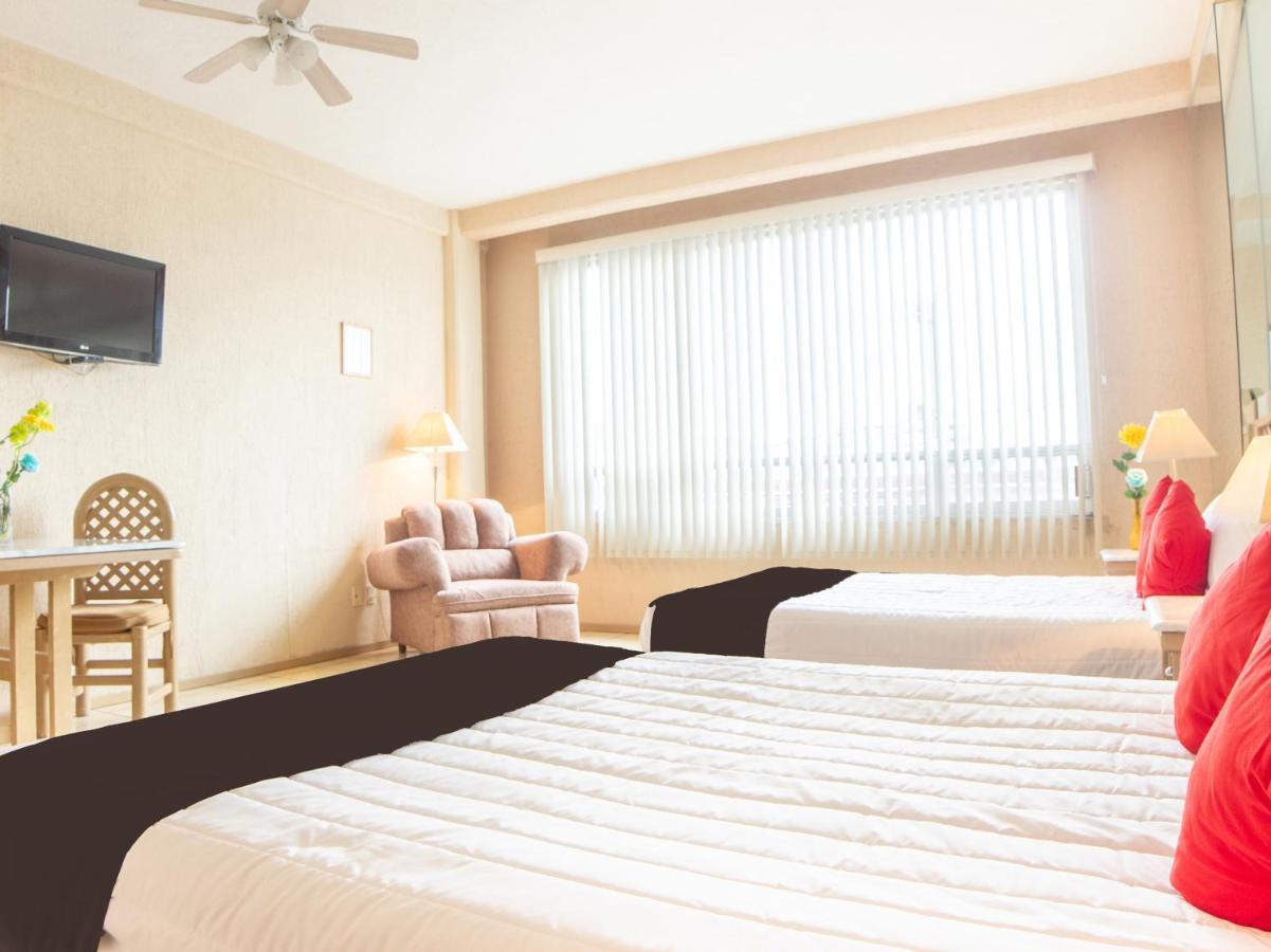 Capital O Hotel Villa Monini Пуэбла Экстерьер фото