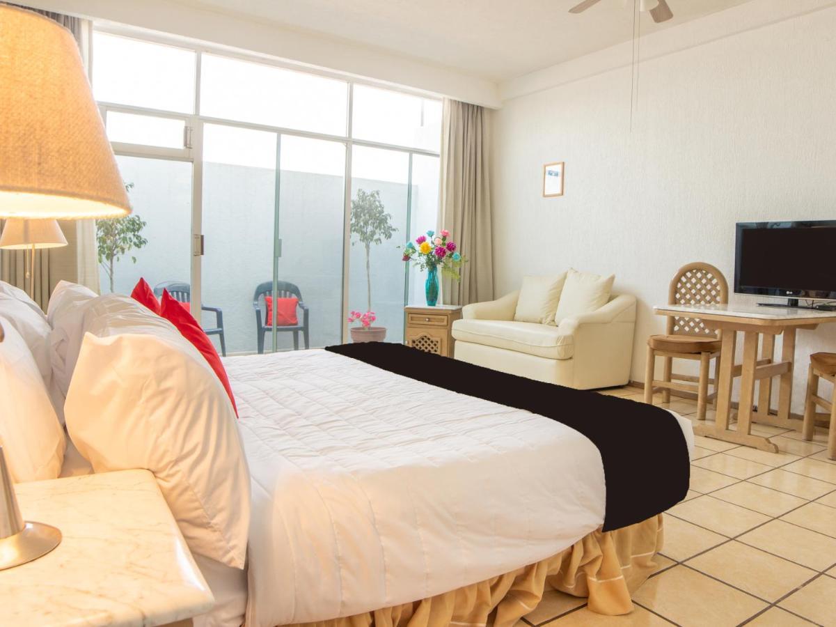 Capital O Hotel Villa Monini Пуэбла Экстерьер фото