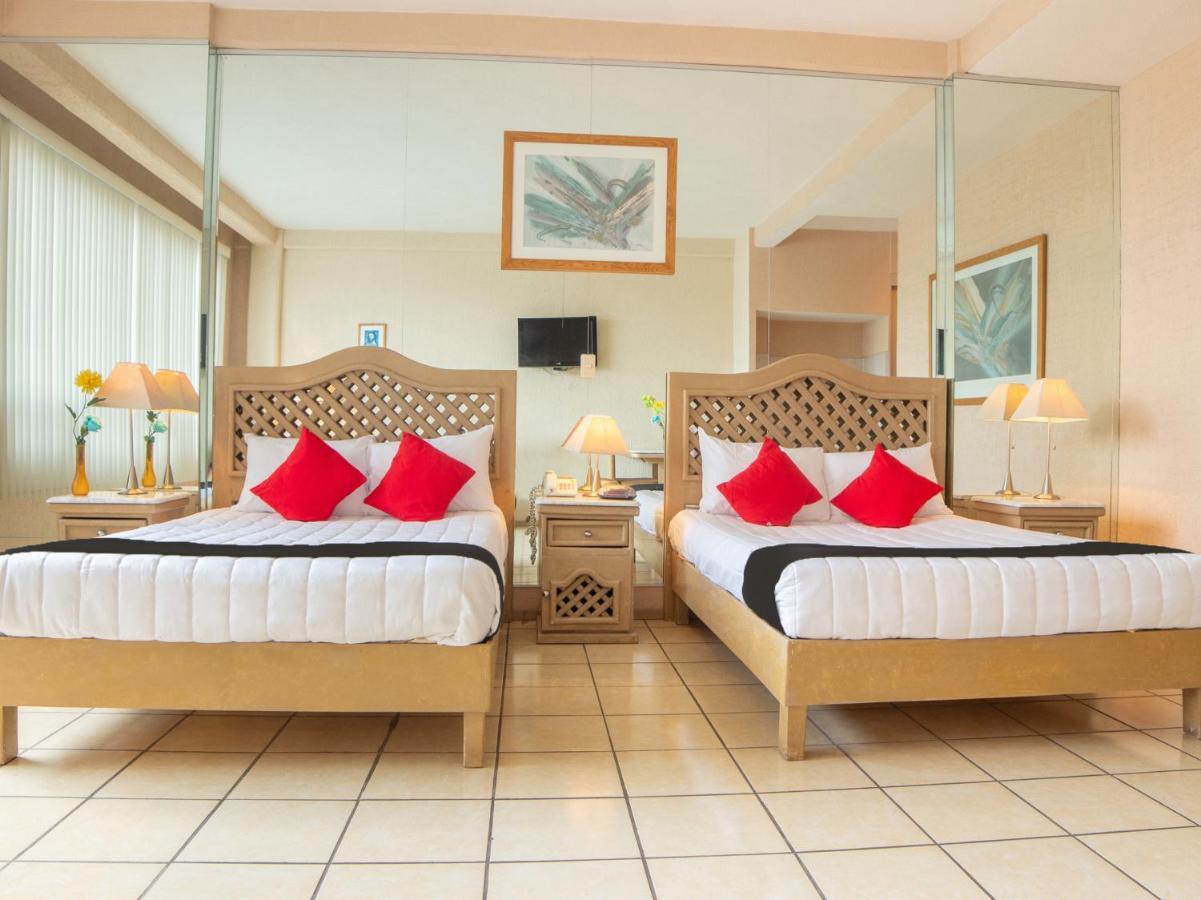 Capital O Hotel Villa Monini Пуэбла Экстерьер фото