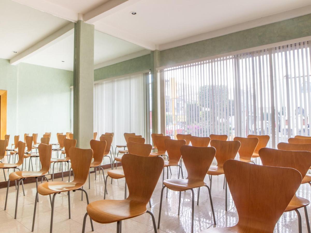 Capital O Hotel Villa Monini Пуэбла Экстерьер фото