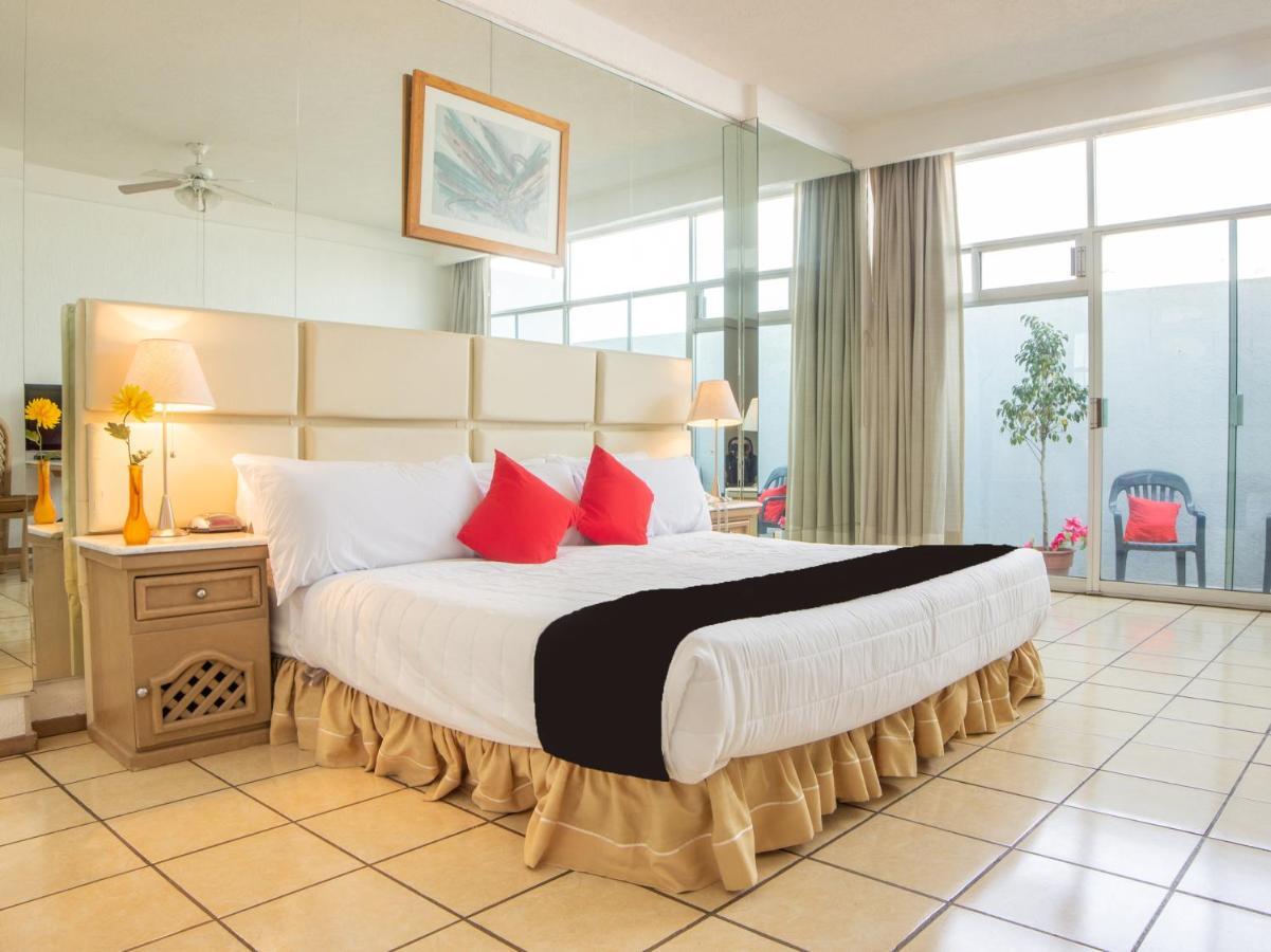 Capital O Hotel Villa Monini Пуэбла Экстерьер фото