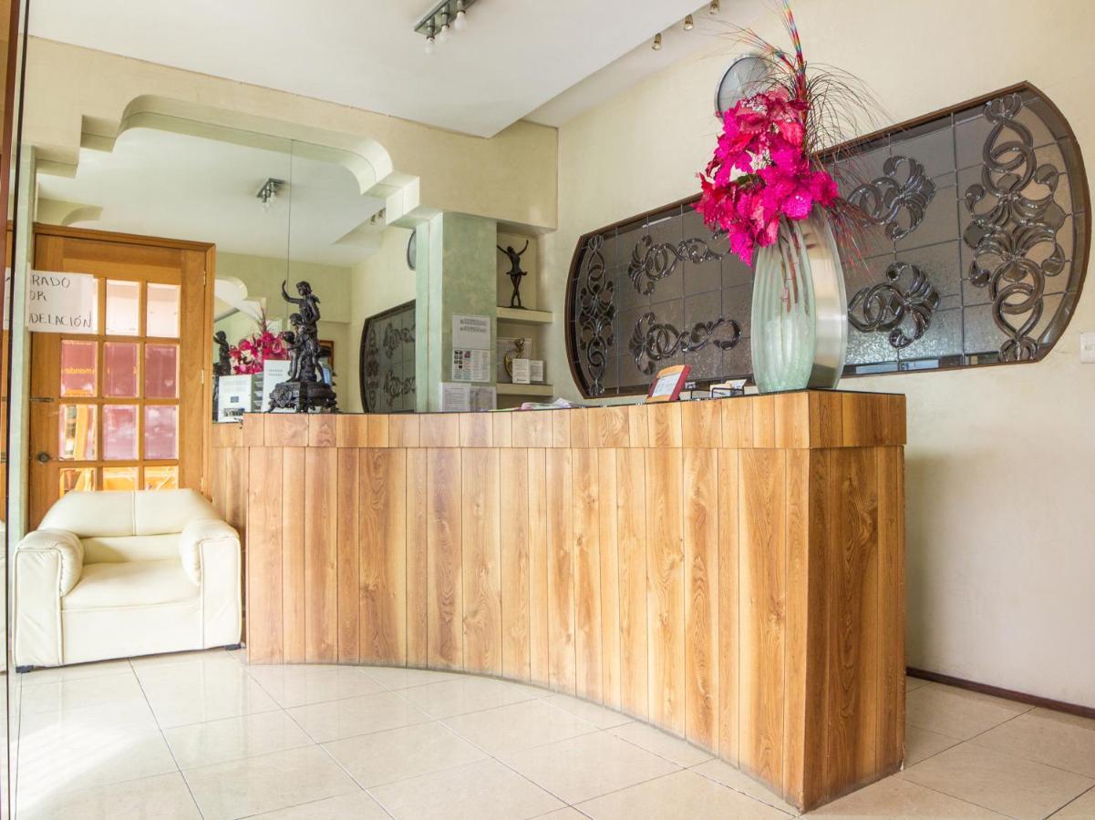 Capital O Hotel Villa Monini Пуэбла Экстерьер фото