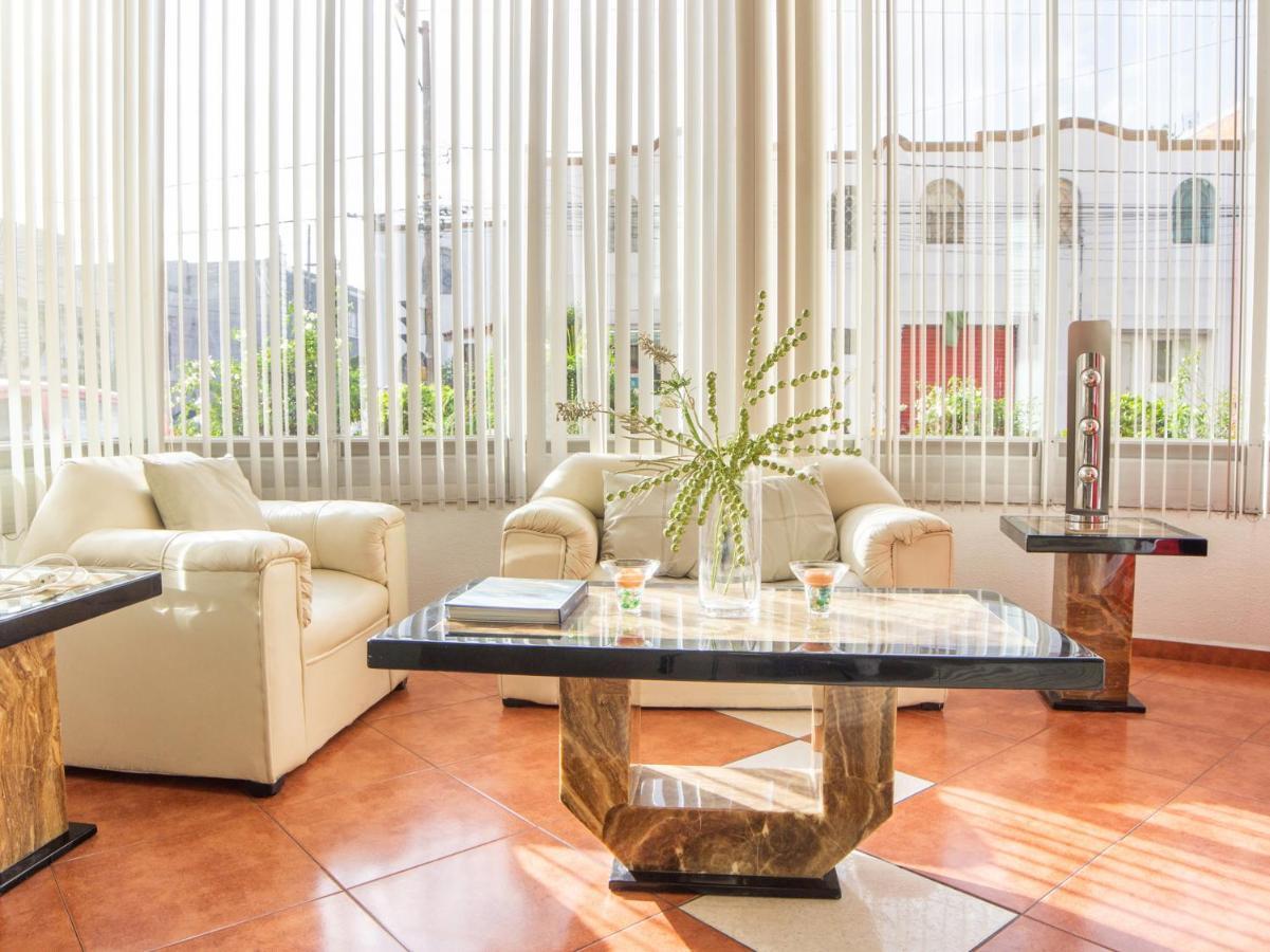 Capital O Hotel Villa Monini Пуэбла Экстерьер фото