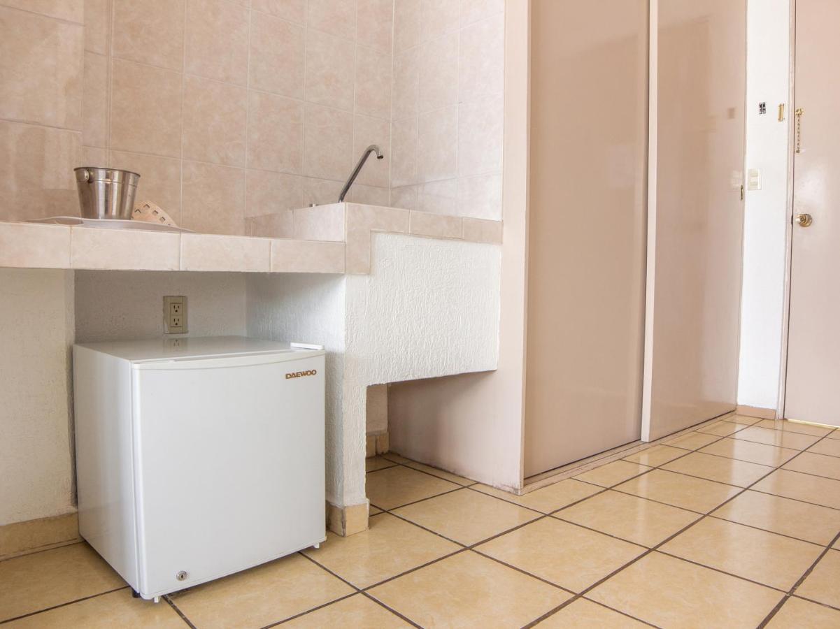 Capital O Hotel Villa Monini Пуэбла Экстерьер фото