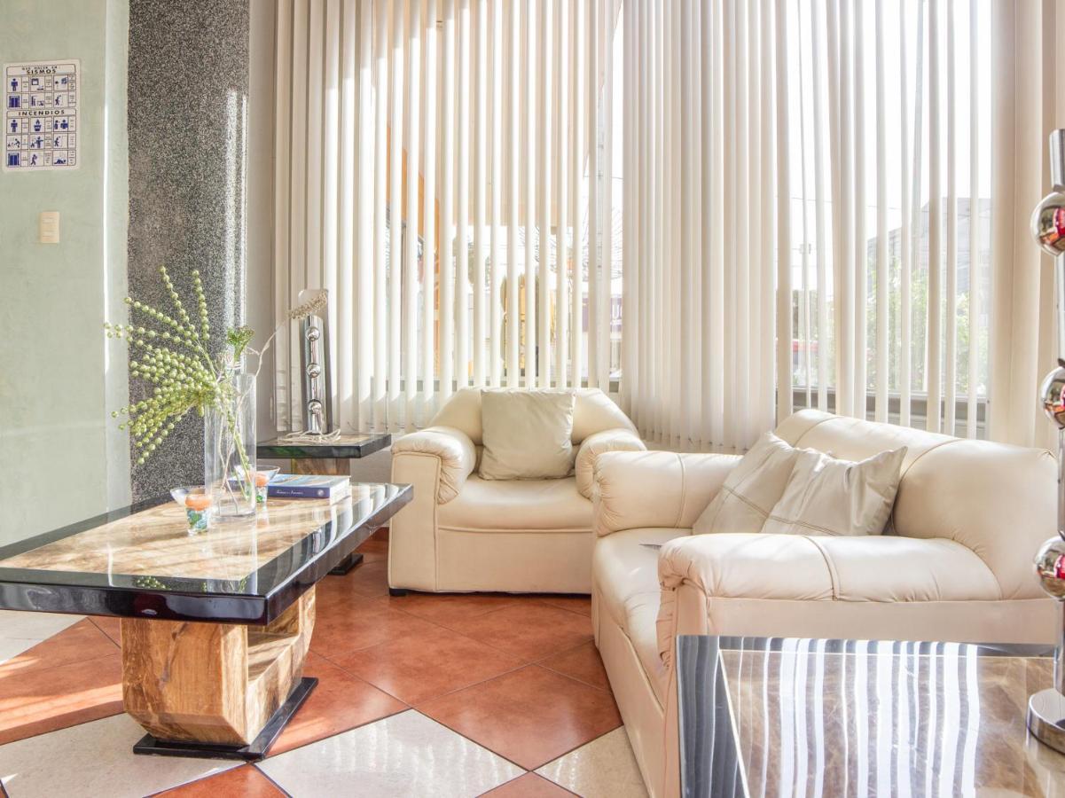 Capital O Hotel Villa Monini Пуэбла Экстерьер фото